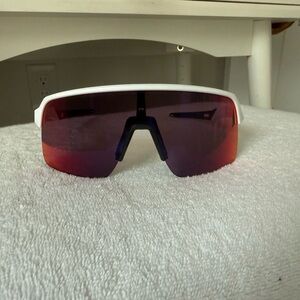 Oakley White Frame Sunglasses with Red Mirrored Shield Lens